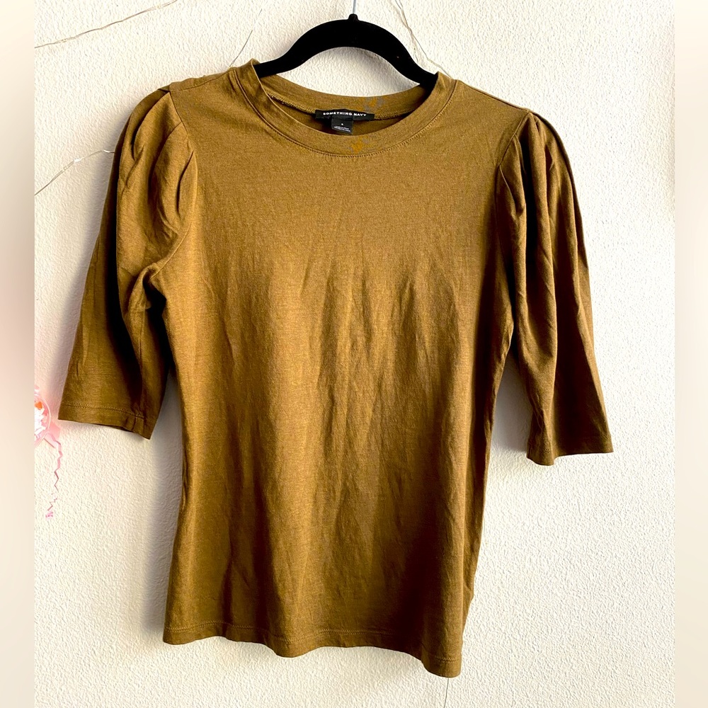 Elbow length top like new. Color is shade of brown